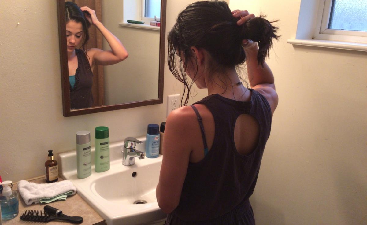 How washing less often can strengthen strands, according to dermatologists